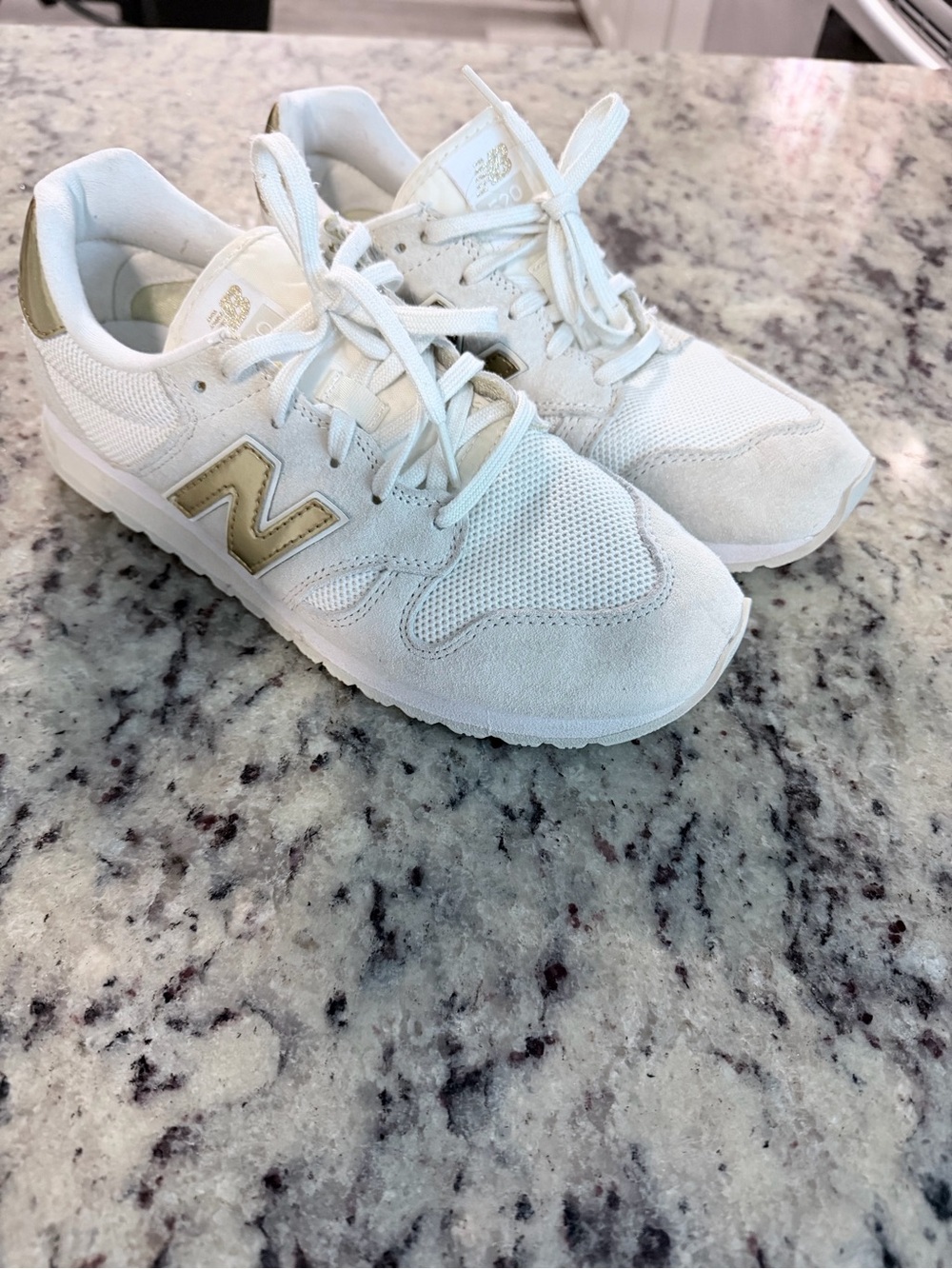New Balance White Sneakers with Gold 'N' Accent